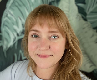 Caity - Headshot_edited.jpg