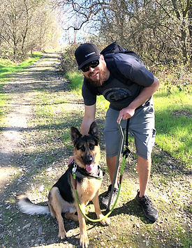 This is a picture of Mike and our German Shepherd Ahab.