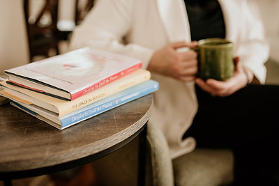 17 Three Books spines with author torso and green mug.jpg