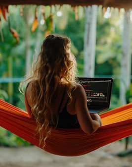 full-shot-woman-hammock-working (1).jpg