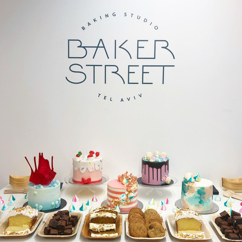 Logo and cake display for Baker Street TLV