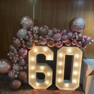 double-stuffed-balloon-arch-with-light-up-numbers-60