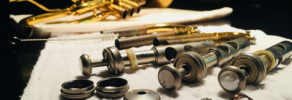 a-trumpet-in-the-process-of-being-cleaned-set-up-on-top-of-a-white-towel.jpg