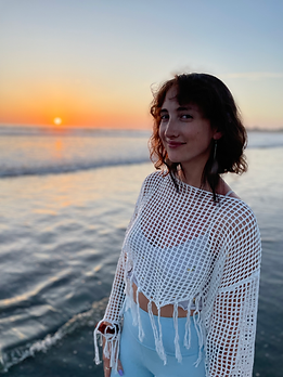 mayagi_The_image_shows_a_silhouetted_gro