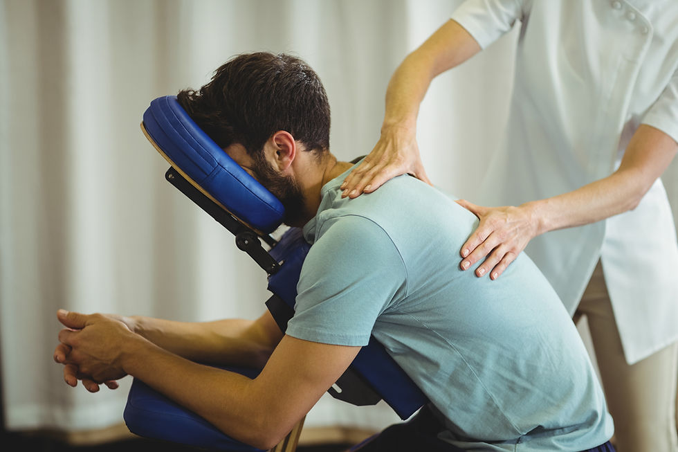 Employee receiving chair massage at work