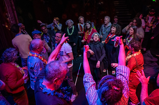 A group of people are dancing joyfully