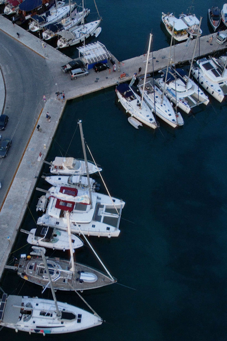 Aerial view of a town quay with boats docked, training location for Docking Drills course in Greece.