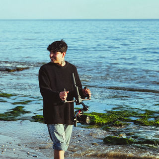 Fırat Gümüştekin film yapımcısı yakın çekim portre