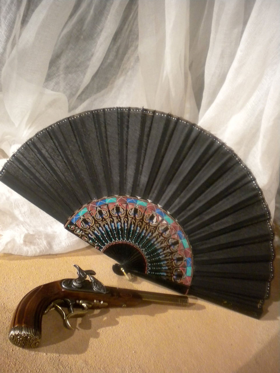 Fan and gun, Candida Erendira, GALA Theatre 2011