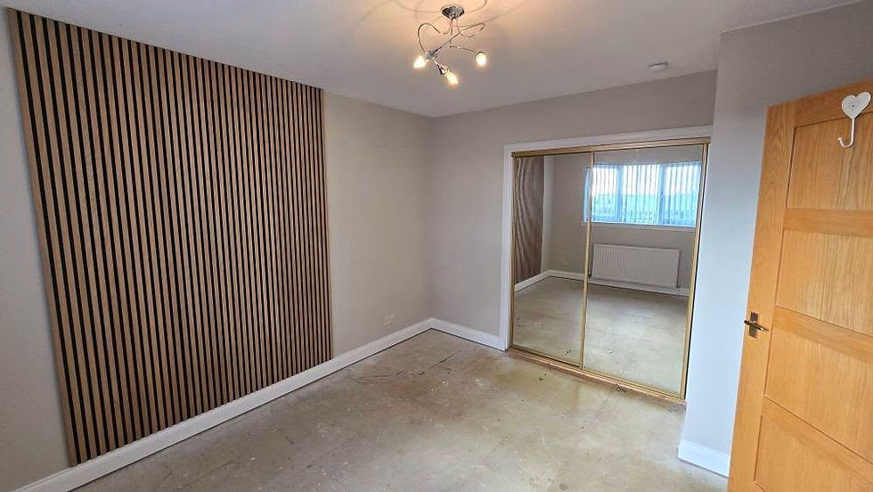 Modern empty bedroom with wooden slat feature wall and mirrored sliding wardrobe doors