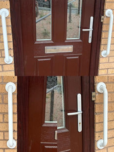 A wooden door with white handle bars misaligned vertically on a brick wall