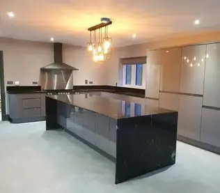 Modern kitchen with sleek black countertops