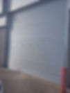 One of our roller shutter installations in an industrial warehouse.