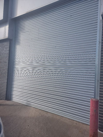 One of our roller shutter installations in an industrial warehouse.