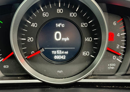 Close-up of a car’s speedometer displaying 0 mph
