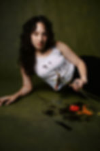 medium format film portrait headshot in nyc studio with florals. unique artist headshots and portraits for queer dancers and performing artists on film