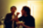guests eating and laughing at indoor reception event