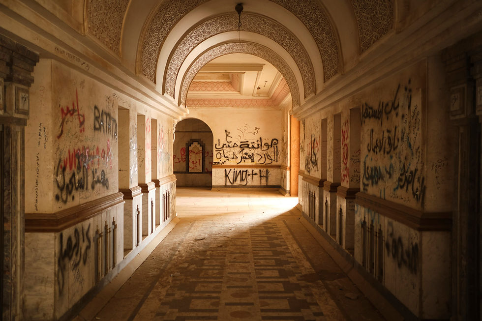 Graffiti covers the walls of Saddam Hussein's Babylon palace