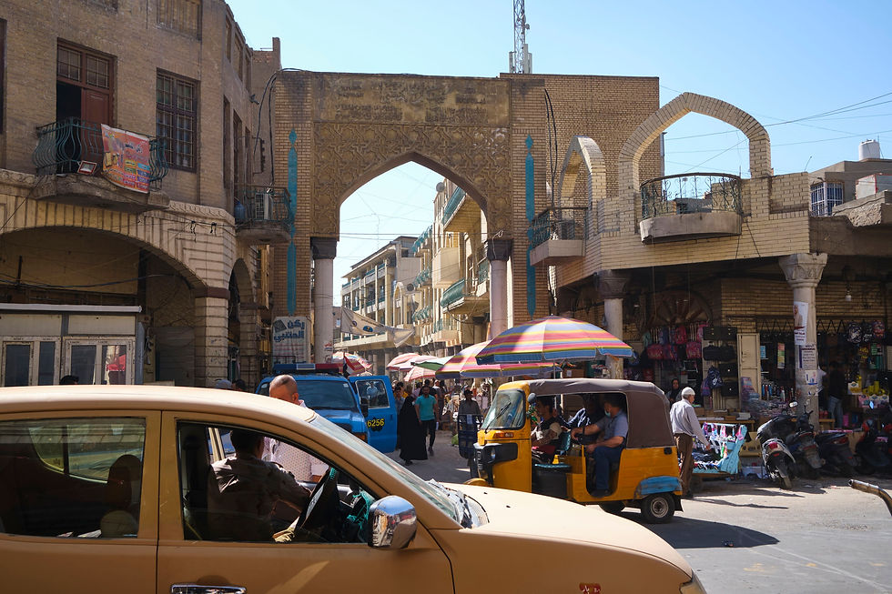 Busy entrace to Al-Mutanabbi street in Baghdad, Iraq.