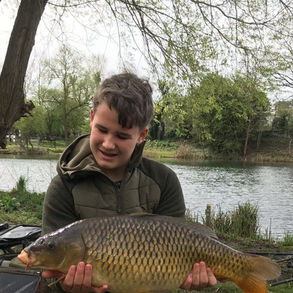 Member Jack Lodge holding a 22.5lb common carp caught at Malcolm Barker Lake