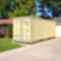 beige shipping container in a driveway.jpg