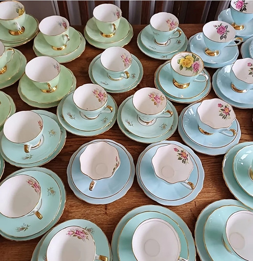 green and blue teacups