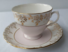 Marshmellow pink & gold leaf tea cup and saucer .jpg