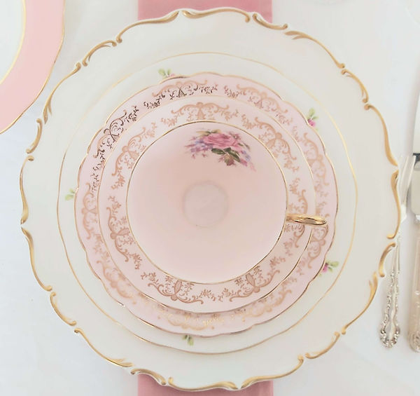 layered plates with soft pink trio