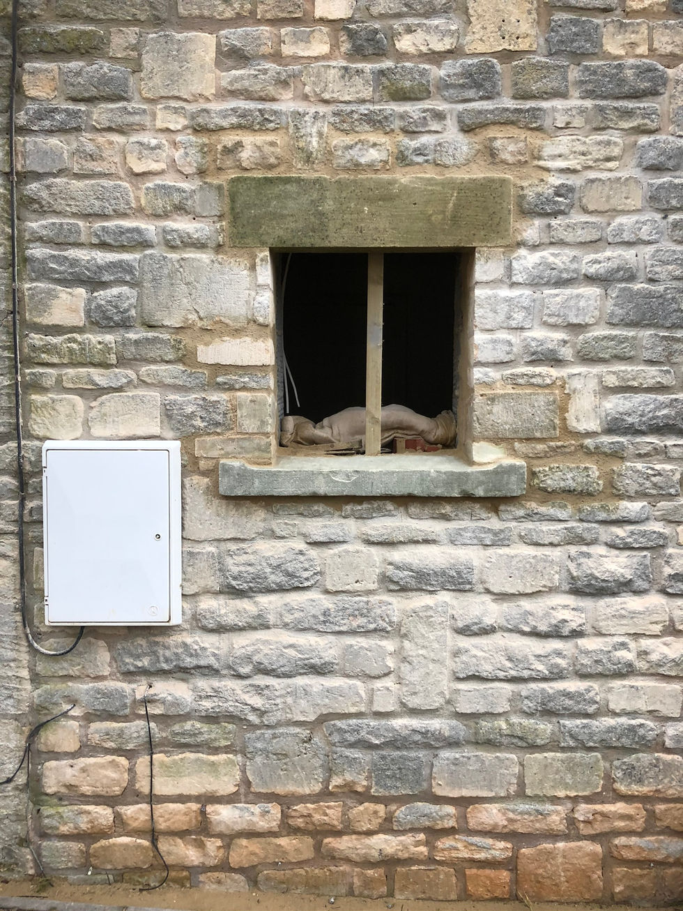 Prepared opening for a hardwood sash window in a traditional Cotswold cottage.