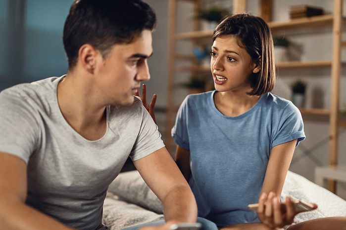 young-couple-having-conflict-arguing-bedroom-focus-is-woman.jpg