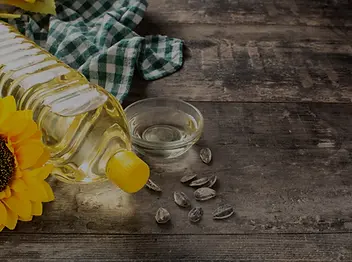 oil-sunflower-oil-plastic-bottle-wooden-table_edited.webp