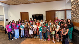 Girl Scouts earning their new Junior Financial Counselor Badges