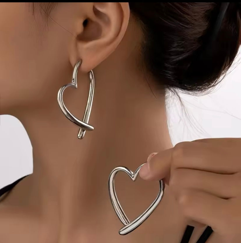 Thumbnail: Love heart crossover earrings