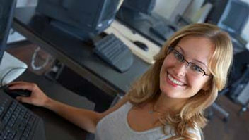 OpenElect OCS page - women operating the machine.jpg