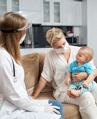 pediatrician-medical-mask-visiting-baby-home.jpg