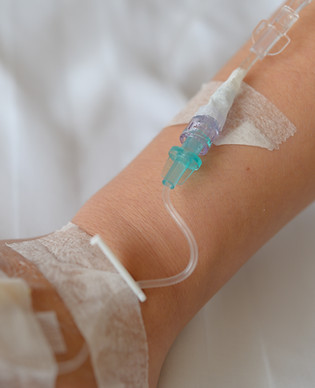 patient-s-hand-with-total-parenteral-nutrition-tpn-being-administered-into-vein.jpg