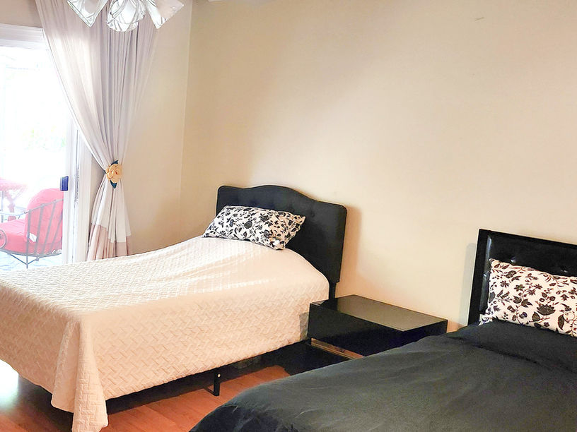 Ideal for companions or those who prefer a shared space, our double single bedroom offers warmth, space, and accessibility with individualized care and comfort.