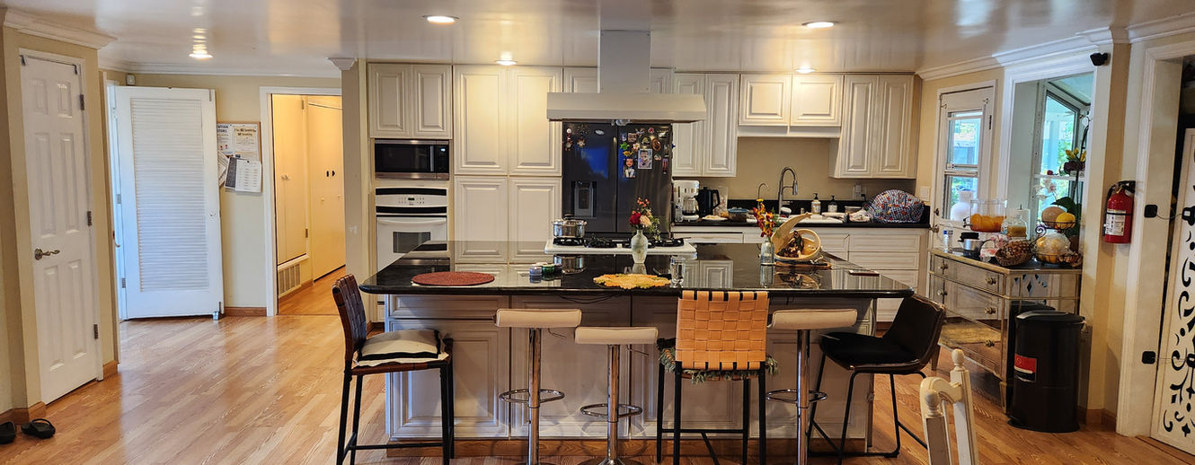 Our large, fully equipped kitchen is the heart of Healing Hands Home. Residents enjoy fresh, home-cooked meals daily, with room to gather, chat, and feel at home.
