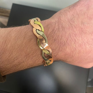 Copper bracelet on someone's wrist.