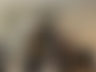 Dr. Brown in front of the GyroStim with Christian McCaffrey