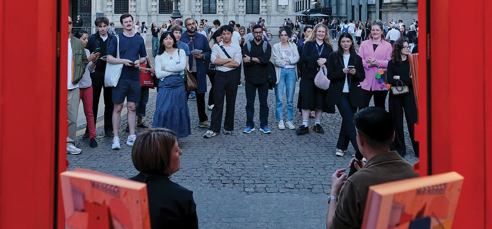 Audience gathering at a Salone del Mobile city event in Milan, reflecting design dialogue, cultural exchange, and public engagement during the international design week