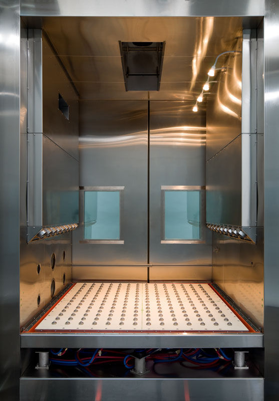 Close-up view of a HASS testing chamber interior showing temperature and humidity sensors