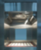 Eye-level view of a technician programming a HASS testing chamber control panel