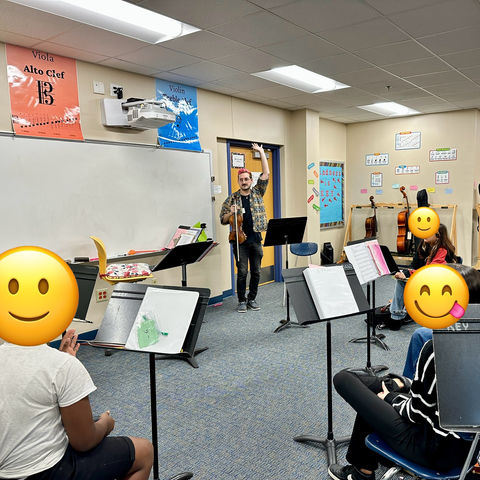 River teaching a group of students in Arlington Schools.