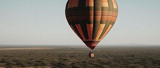 Hot air balloon over Kenya scene in dark olive green and bronze colours.jpg