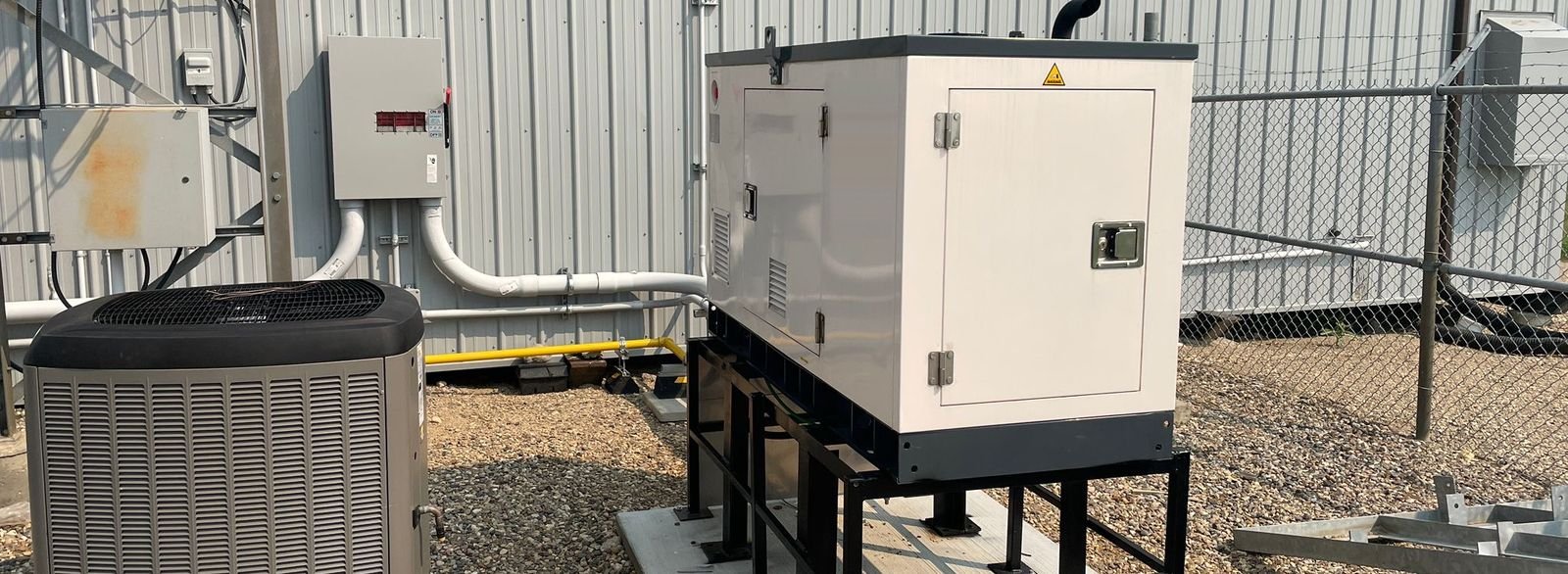 Standby generator installed outside a commercial building, Lock Hill