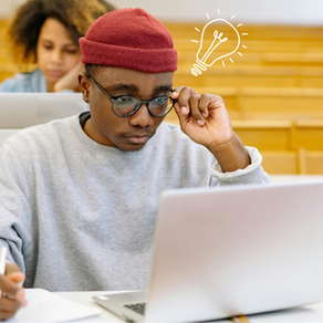 A man looking at his laptop