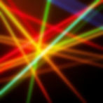 black background with alot of  red, yellow, blue, green laser beams criss crossing.jpg