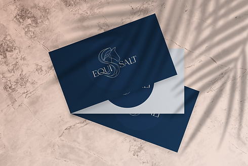 Navy blue business cards on a granite background