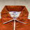 Thumbnail: 70’s NIKE PINWHEEL LOGO PRINT NYLON HALF ZIP PULLOVER JACKET ORANGE SWOOSH LABEL